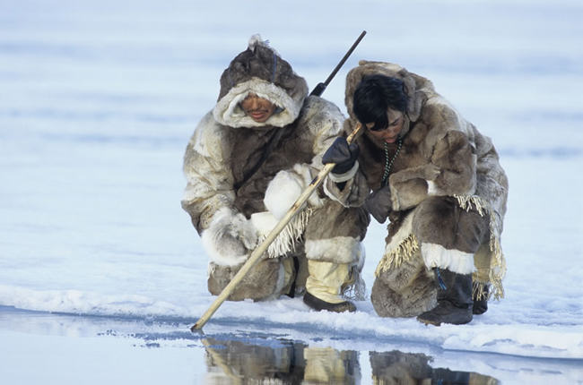 inuit ice fishing, caribou fur