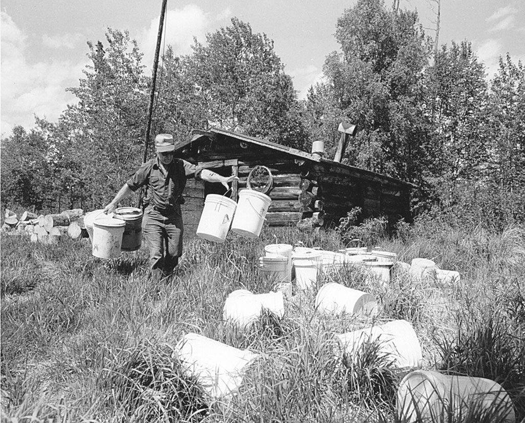 Gene Walters with bait pails at Meekwap Lake